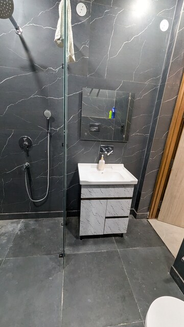 Bathroom in 3 BHK Apartment at Ashoka Enclave 3, Sector 35 – for Rent