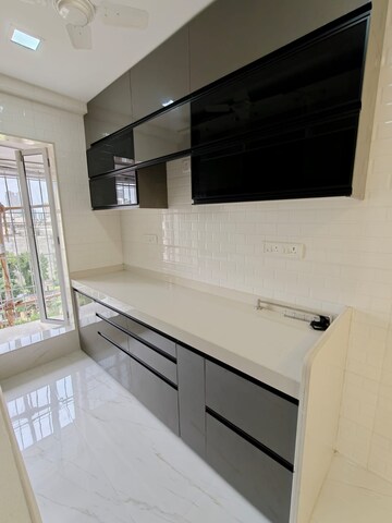 Kitchen in 2 BHK Apartment at Ajmera Arham, Malad West – for Rent