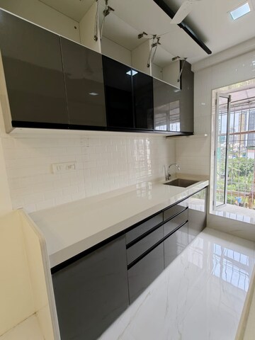 Kitchen in 2 BHK Apartment at Ajmera Arham, Malad West – for Rent