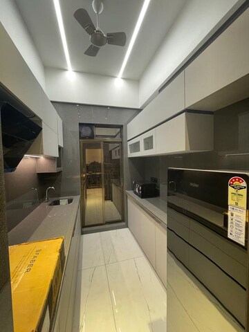 Kitchen in 2 BHK Apartment at Tharwani Meghna Montana, Ambernath West – for Rent