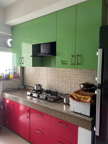Kitchen in 3 BHK Apartment at Emaar Gurgaon Greens, Sector 102 – for Sale