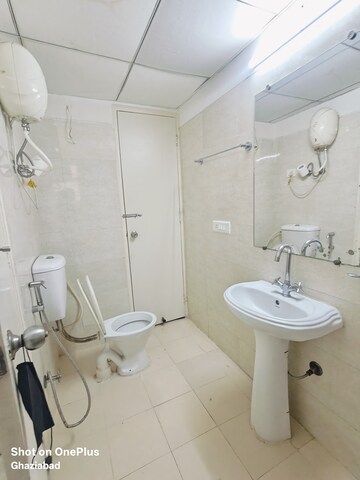 Bathroom in 3 BHK Apartment at Gaur City 2 - 12th Avenue, Sector 16c Greater Noida – for Rent