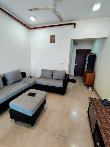 Living Room in 2 BHK Apartment at Omkar Ananta, Goregaon East – for Rent