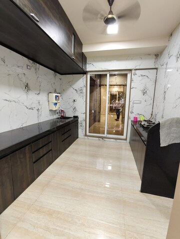 Kitchen in 4 BHK Apartment at Rashmi Signature, Mira Road – for Rent