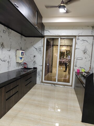Kitchen in 4 BHK Apartment at Rashmi Signature, Mira Road – for Rent
