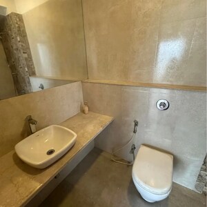 Bathroom in 2 BHK Apartment at Omkar Alta Monte, Laxman Nagar – for Sale