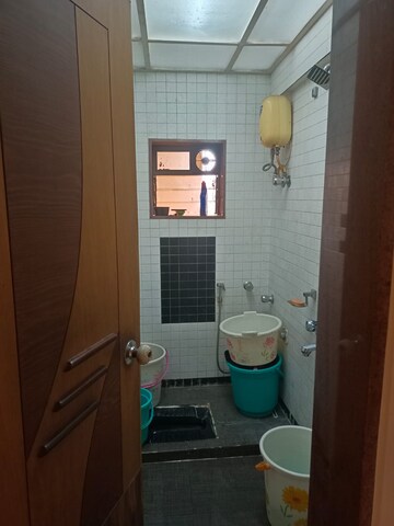 Bathroom in 1 BHK Apartment at Gokuldham Complex, Goregaon East – for Rent