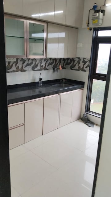 Kitchen in 4 BHK Apartment at Amardeep Apartment Chembur, Chembur – for Rent