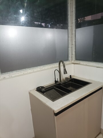 Kitchen in 3 BHK Apartment at Vaish CHS, Sector 45 – for Sale