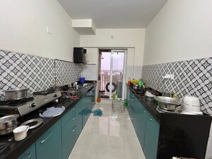 Kitchen in 2 BHK Apartment at Shree Tirupati STG Signature Residency, Patlipada – for Sale