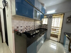 Kitchen in 2 BHK Apartment at Cosmos Jewels, Ghodbunder Road – for Sale
