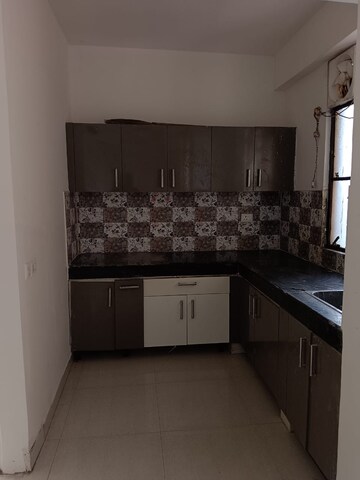 Kitchen in 2 BHK Apartment at Signature Orchard Avenue 2, Sector 93 – for Rent