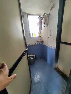 Bathroom in 1 BHK Apartment at Puranik City, Kasarvadavali – for Sale