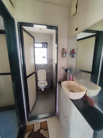 Bathroom in 1 BHK Apartment at Puranik City, Kasarvadavali – for Sale