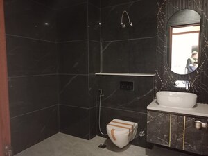Bathroom in 3 BHK Builder Floor at Amolik Aster Woods, Sector 98 – for Sale