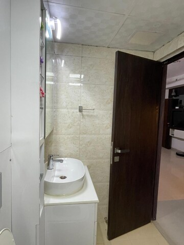 Bathroom in 2 BHK Apartment at Windsor Paradise 2, Raj Nagar Extension – for Rent