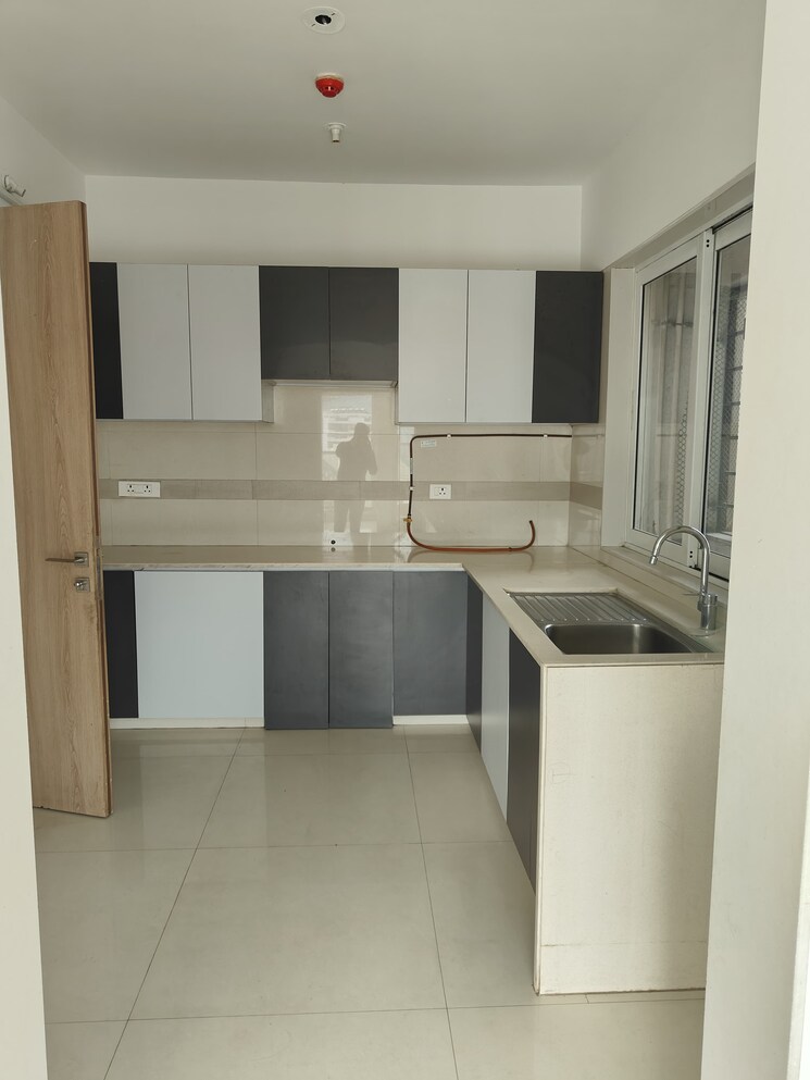 Kitchen, dosti-imperia-phase-ii 3 Bedroom 1150 Sq.Ft. Apartment In Ghodbunder Road Thane 8974125