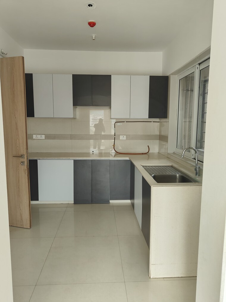Kitchen, dosti-imperia-phase-ii 3 Bedroom 1150 Sq.Ft. Apartment In Ghodbunder Road Thane 8974125