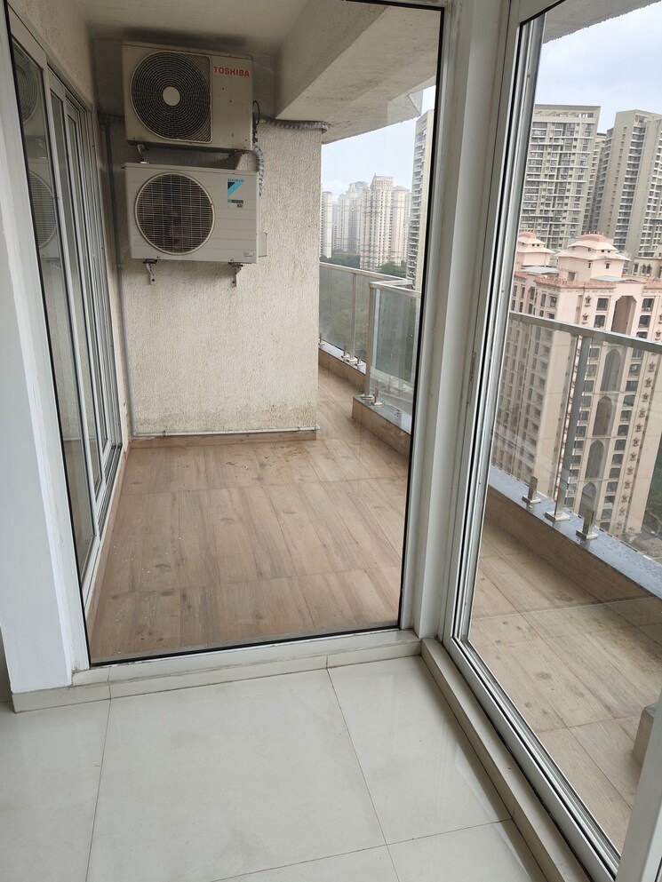 Balcony, dosti-imperia-phase-ii 3 Bedroom 1150 Sq.Ft. Apartment In Ghodbunder Road Thane 8974125