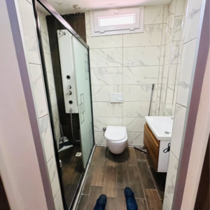 Bathroom in 2 BHK Apartment at Omkar Alta Monte, Laxman Nagar – for Sale