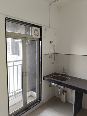 Kitchen in 1 BHK Apartment at Ashar Metro Towers, Vartak Nagar – for Sale