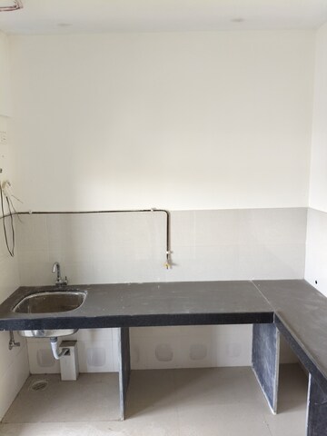 Kitchen in 1 BHK Apartment at Ashar Metro Towers, Vartak Nagar – for Sale