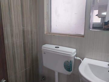 Bathroom in 2 BHK Apartment at Pivotal Riddhi Siddhi, Sector 99 – for Rent