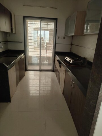 Kitchen in 3 BHK Apartment at Regency Cosmos, Baner – for Rent