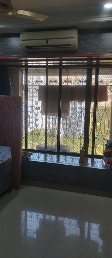 Bedroom in 2 BHK Apartment at Dheeraj Darshan, Jogeshwari East – for Rent
