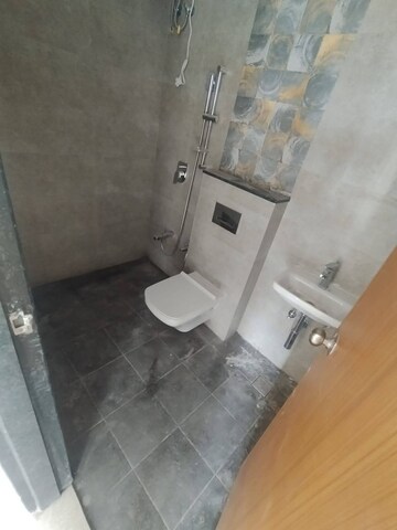 Bathroom in 2 BHK Apartment at Naman Habitat, Andheri West – for Rent