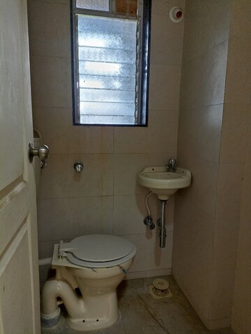Bathroom in 1 BHK Apartment at Gagangiri Complex, Dahisar West – for Sale