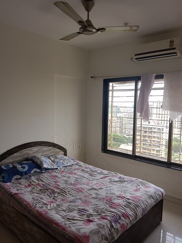 Bedroom in 2 BHK Apartment at Gini Apartment, Malad East – for Rent