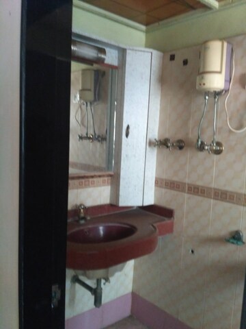 Bathroom in 4 BHK Apartment at Eugene Apartment, Borivali West – for Sale