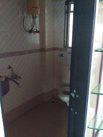 Bathroom in 4 BHK Apartment at Eugene Apartment, Borivali West – for Sale