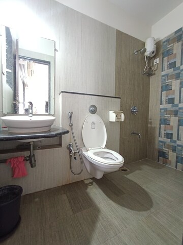 Bathroom in 3 BHK Apartment at Avirahi Homes, Borivali West – for Rent