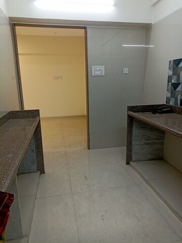 Kitchen in 3 BHK Apartment at Mallhar Bhimashankar Heights, Dahisar West – for Sale