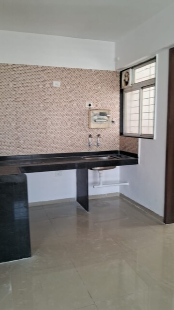 Kitchen in 2 BHK Apartment at Gagan Micasaa, Wagholi – for Rent