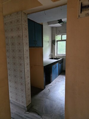 Kitchen in 2 BHK Apartment at Sahayog Complex, Manpada – for Sale