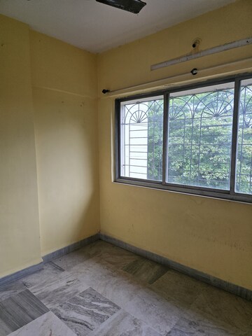 Room in 2 BHK Apartment at Sahayog Complex, Manpada – for Sale