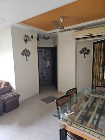 Living Room in 2 BHK Apartment at Happy Valley, Manpada – for Rent