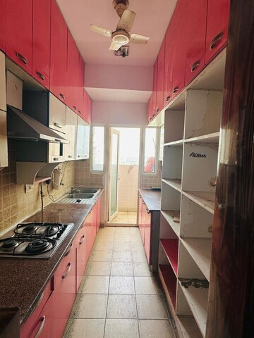 Kitchen in 3 BHK Apartment at Mahagun Moderne, Sector 78 – for Rent