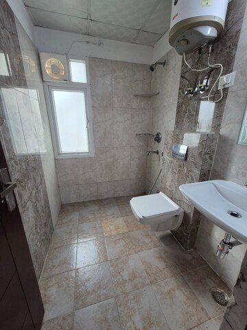 Bathroom in 2.5 BHK Apartment at Gaur City 5th Avenue, Sector 4 Greater Noida – for Sale