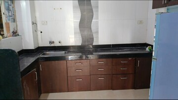 Kitchen in 2 BHK Apartment at Sree Mangal Queens Tower, Aundh – for Rent
