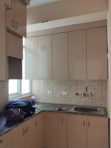 Kitchen in 2.5 BHK Apartment at Amrapali Dream Valley, Tech Zone 4 Greater Noida – for Rent