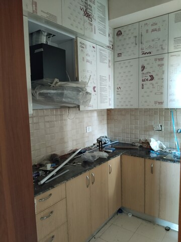 Kitchen in 3 BHK Apartment at Amrapali Dream Valley, Tech Zone 4 Greater Noida – for Rent