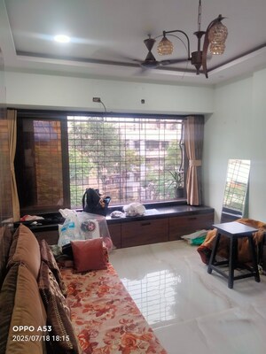 Living Room in 2 BHK Apartment at Mahim West – for Sale