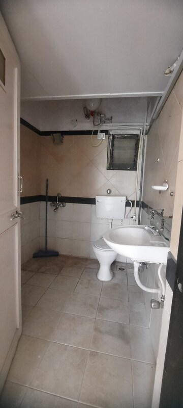Bathroom in 2 BHK Apartment at New Mhada Towers, Andheri West – for Sale