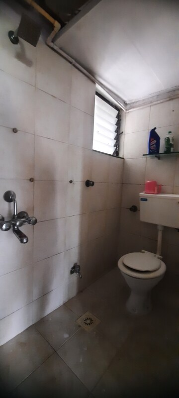 Bathroom in 2 BHK Apartment at New Mhada Towers, Andheri West – for Sale