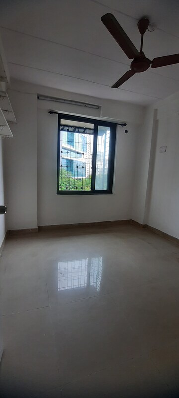 Bedroom in 2 BHK Apartment at New Mhada Towers, Andheri West – for Sale