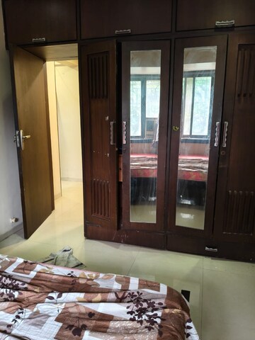 Living Room in 1 BHK Apartment at Rudransh CHS, Seawoods – for Rent